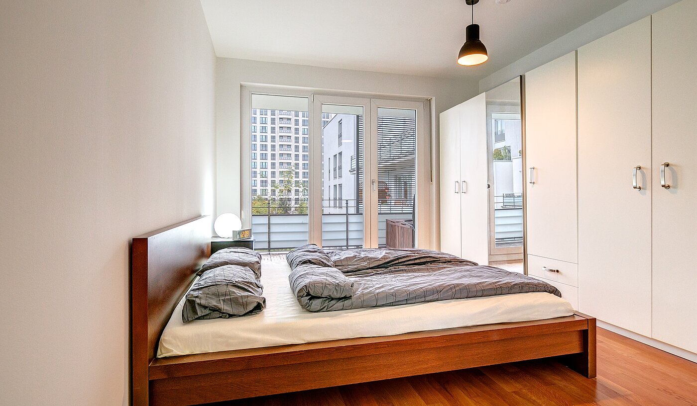 Квартира в многоэтажно доме с 2.5 комнатами | 70020 | Schlafzimmer...