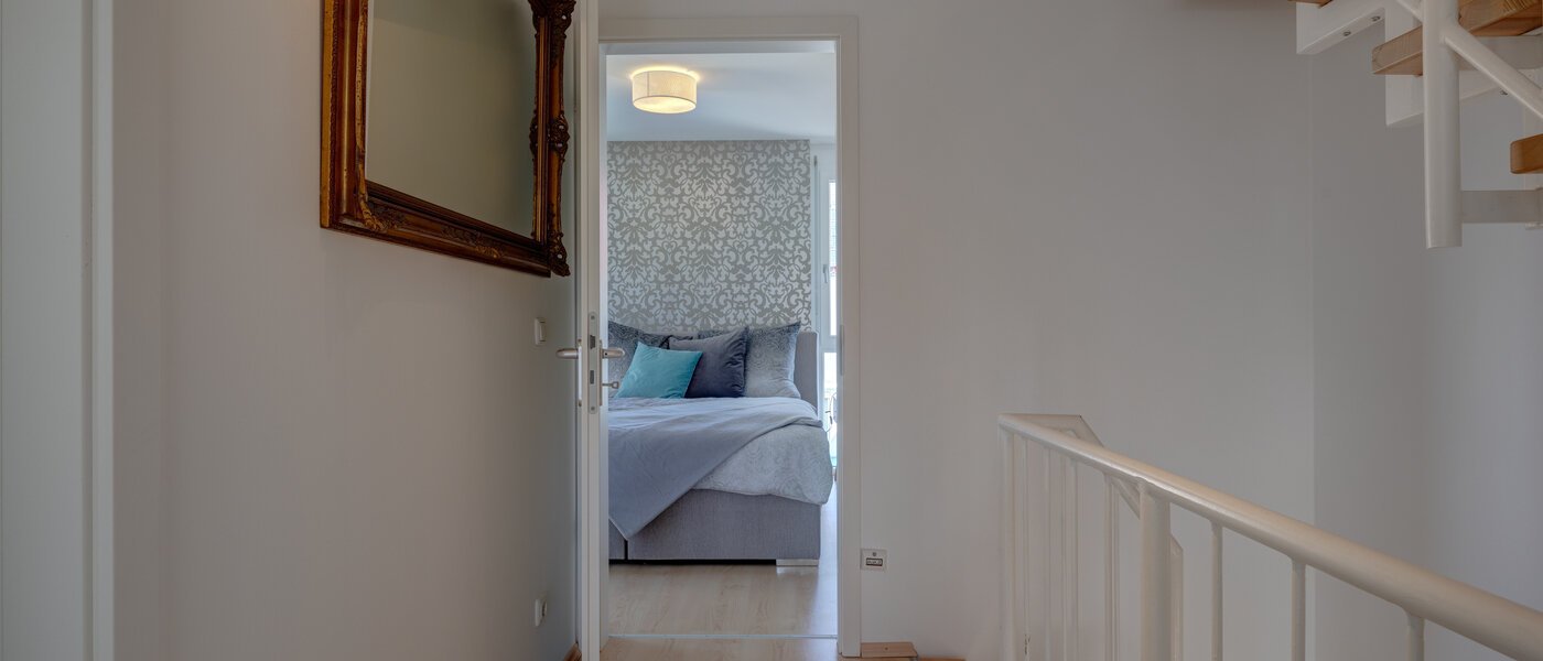 Половина двухквартирного жилого дома Gröbenzell 03 коридор 11015