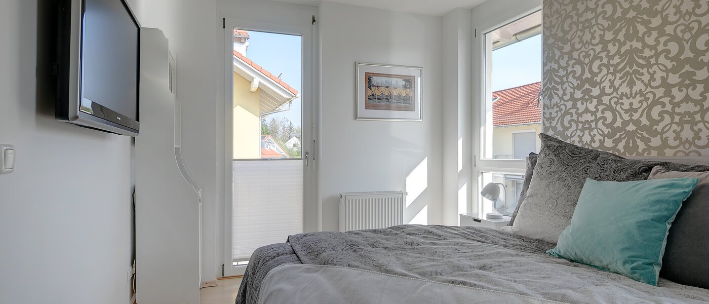 Половина двухквартирного жилого дома Gröbenzell 01 спальная комната 11015