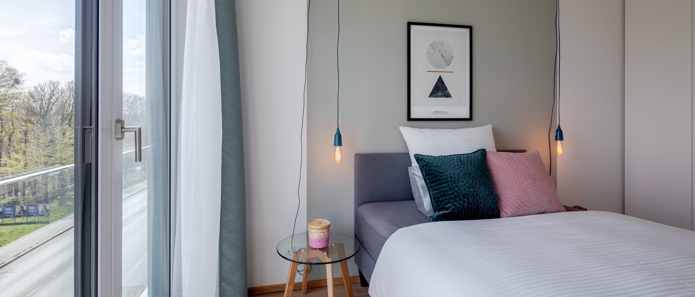 квартира München Obersendling 01 спальная комната 11350