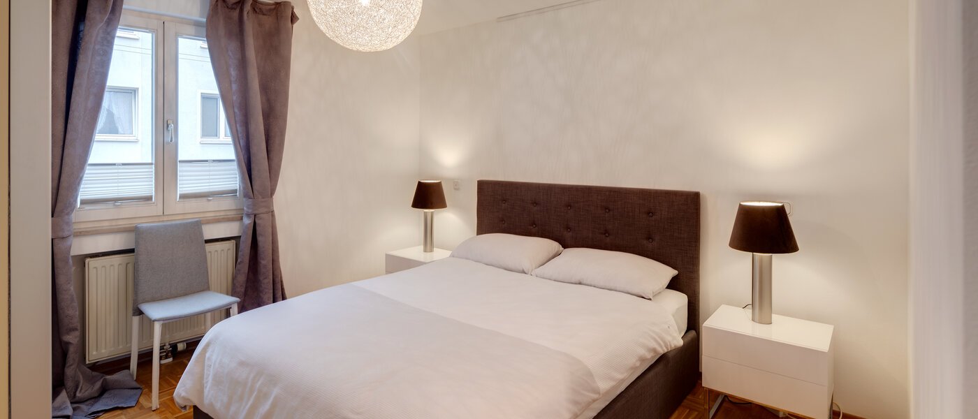 квартира München Lehel 01 спальная комната 11361