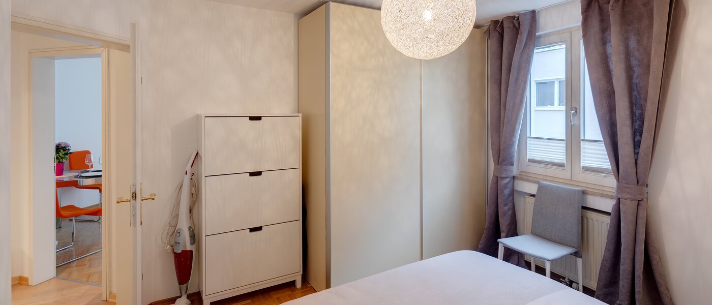 квартира München Lehel 02 спальная комната 11361