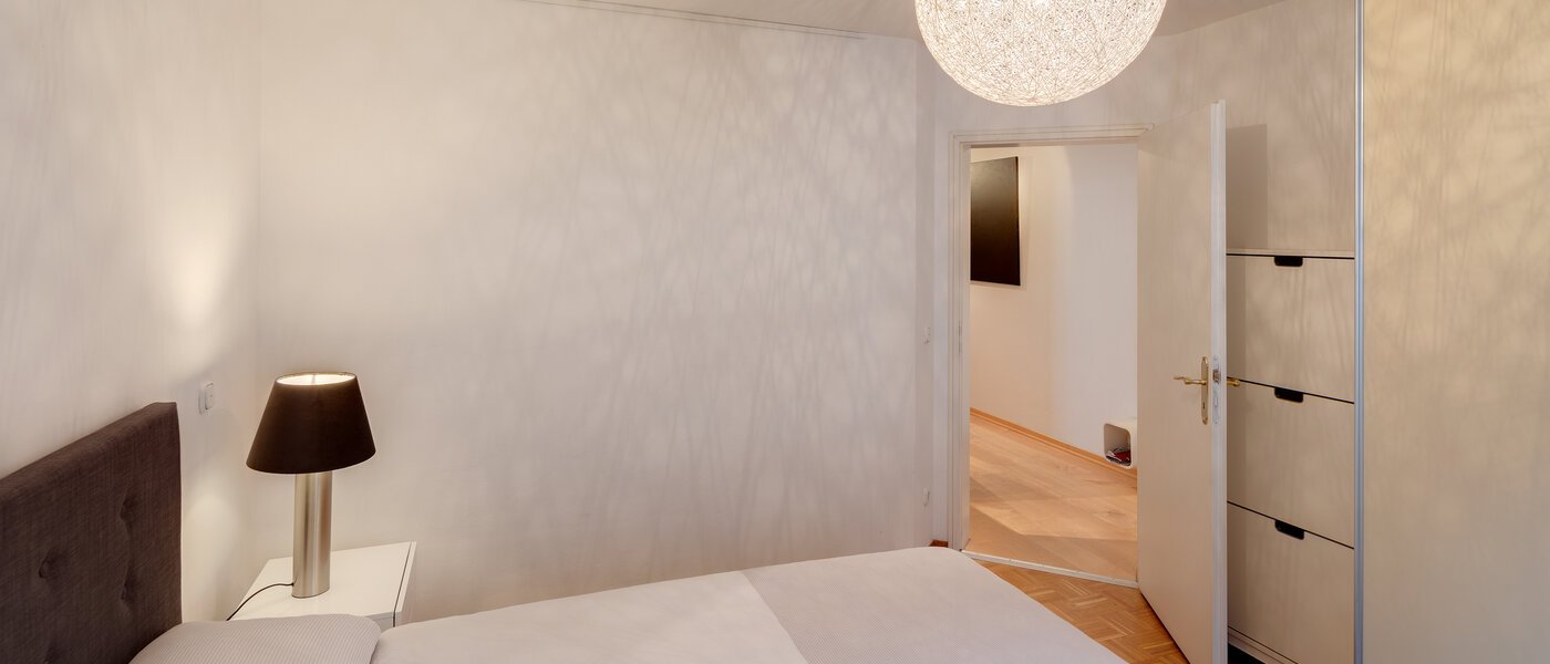 квартира München Lehel 03 спальная комната 11361