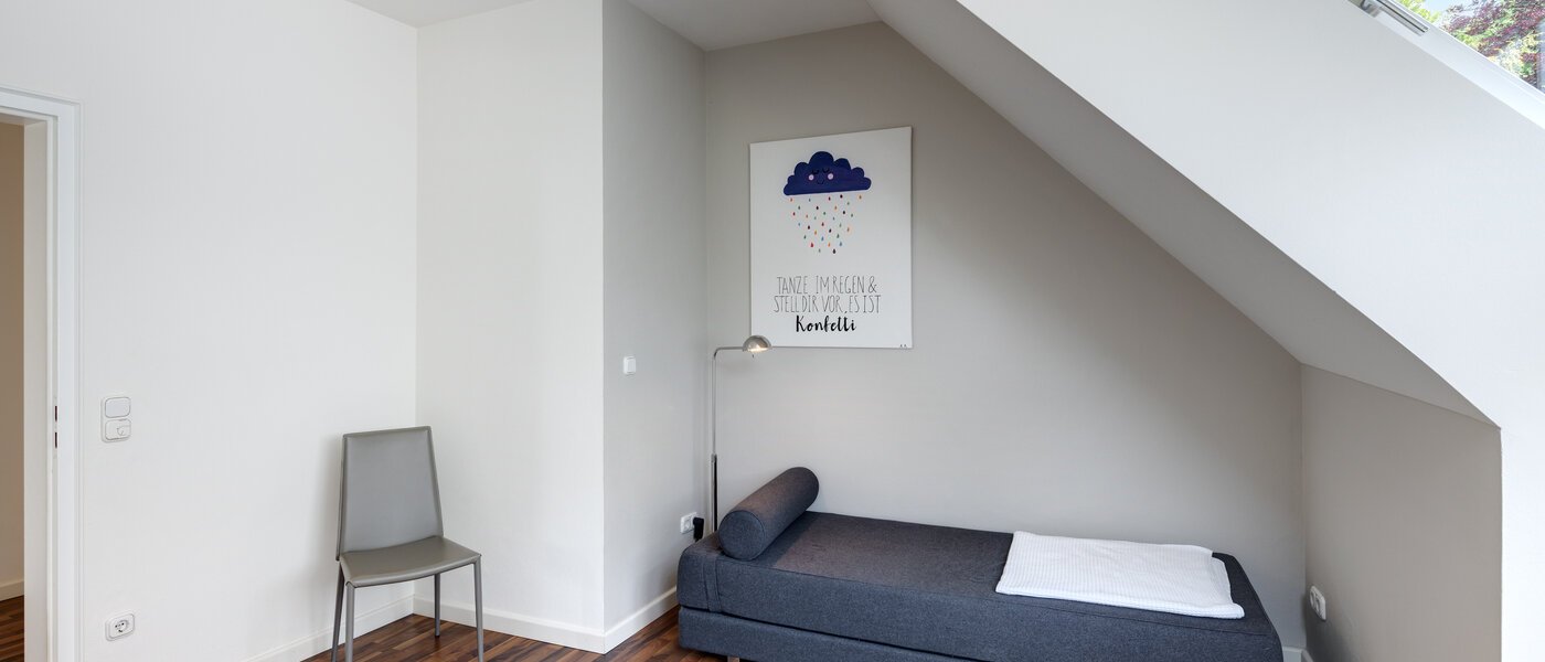 Половина двухквартирного жилого дома Grünwald 02 гостевая комната 14454