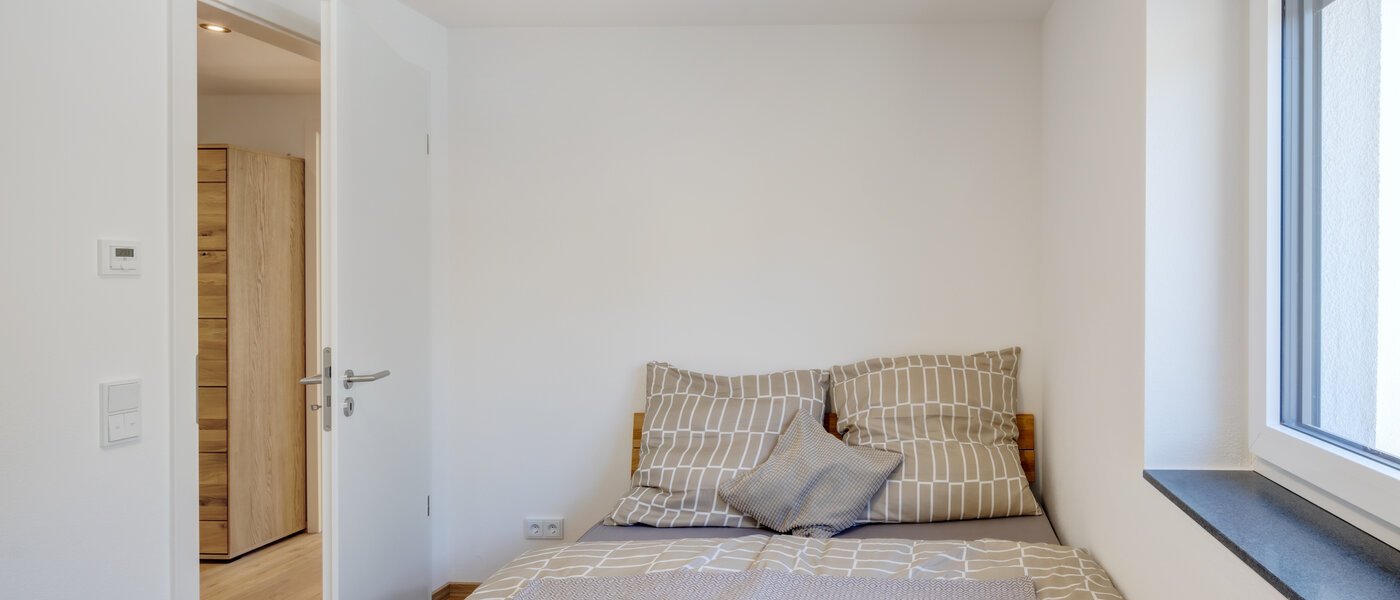 квартира Neufahrn b. Freising 02 спальная комната 14560