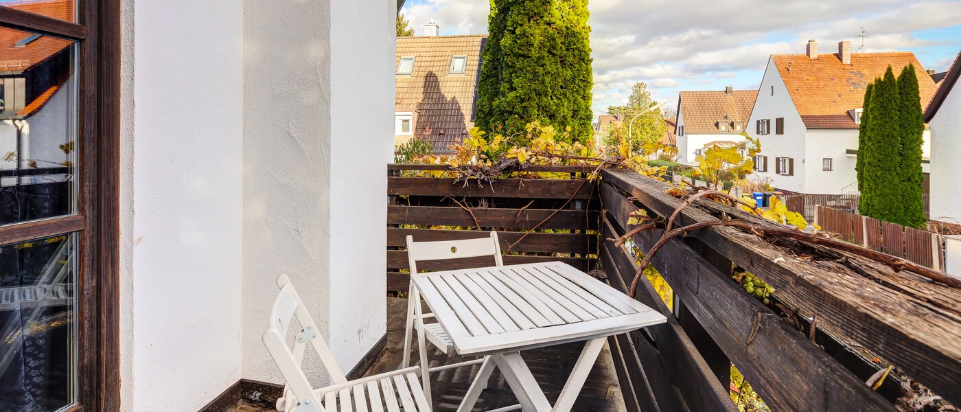 Половина двухквартирного жилого дома München Obersendling 01 балкон 14567