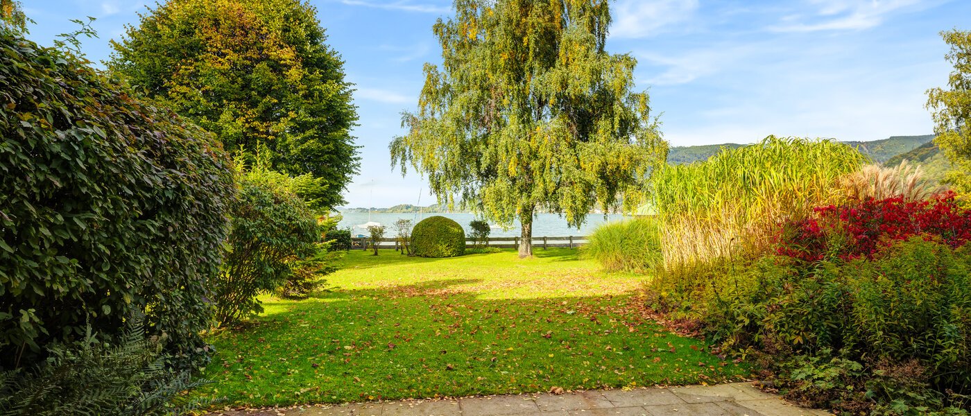 Половина двухквартирного жилого дома Rottach-Egern 01 сад 14616