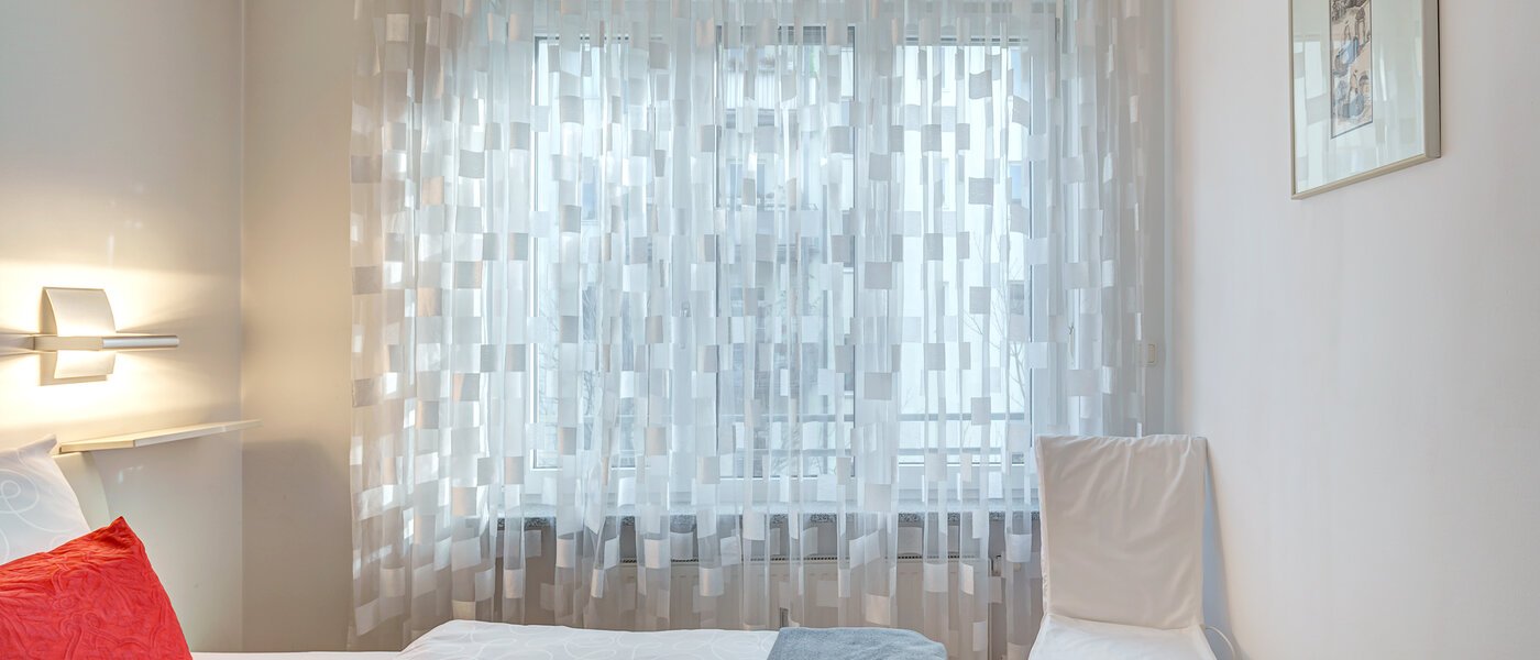 квартира München Lehel 02 спальная комната 1615