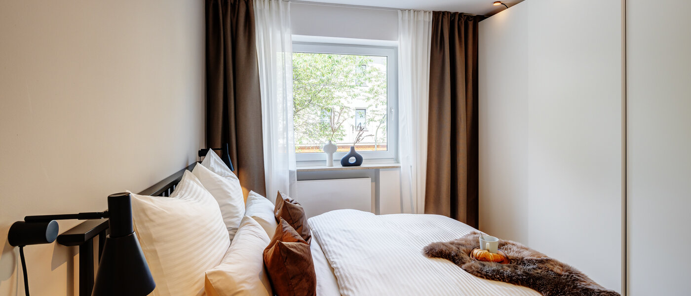 квартира München Milbertshofen 01 спальная комната 7233