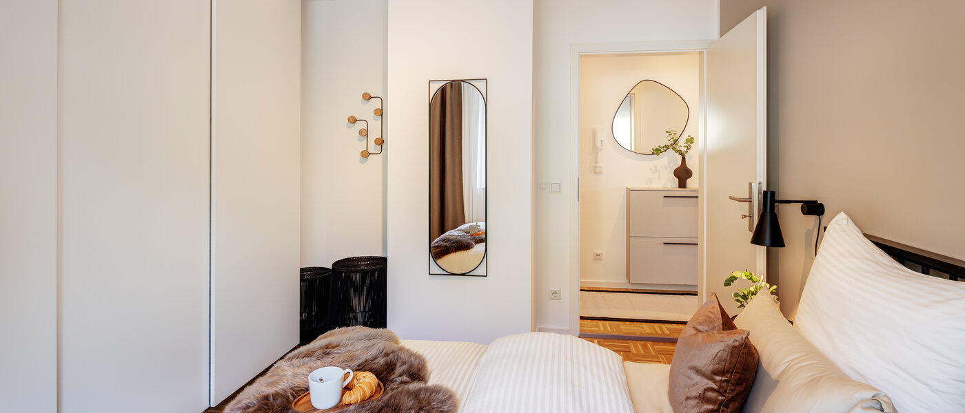 квартира München Milbertshofen 04 спальная комната 7233