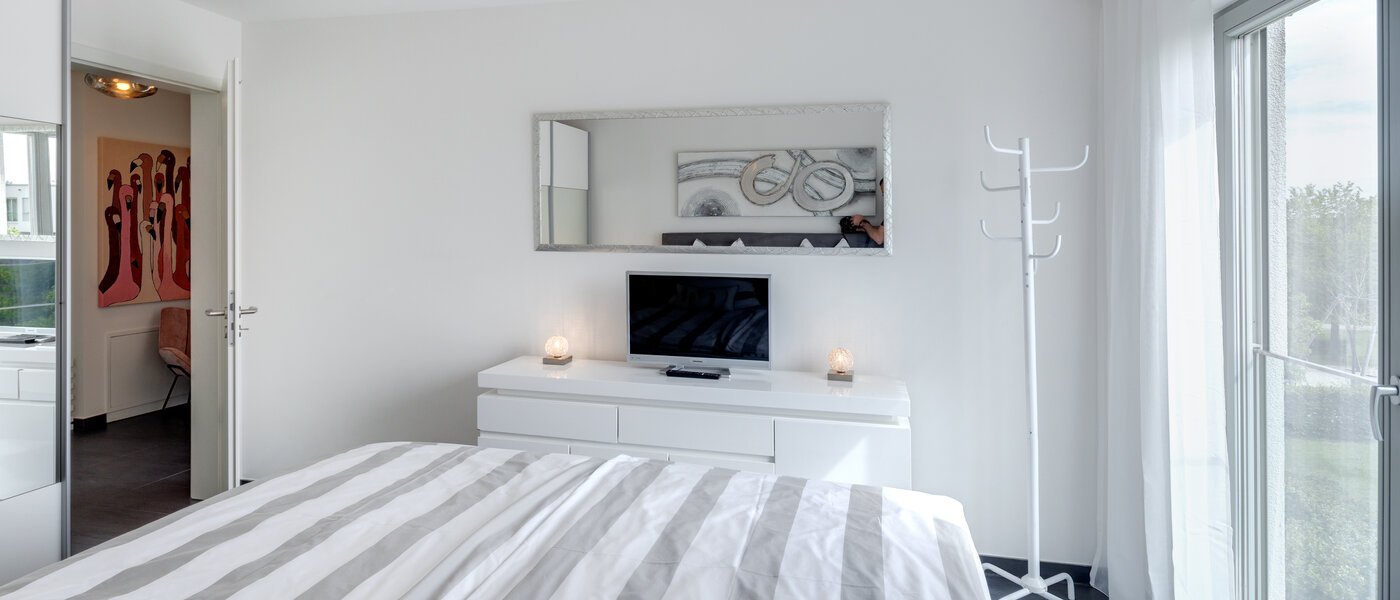 квартира München Messestadt Riem 04 спальная комната 9917