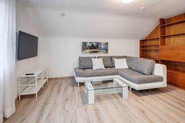 Изысканная мансардная квартира в Pullach im Isartal