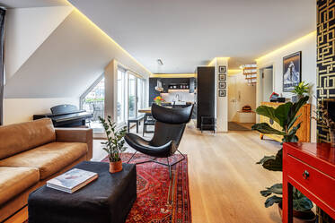 Эксклюзивно меблированная двухэтажная квартира в Obergiesing