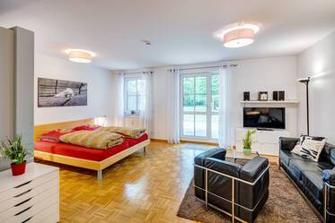 Просторная 1-комнатная квартира в Харлахинге