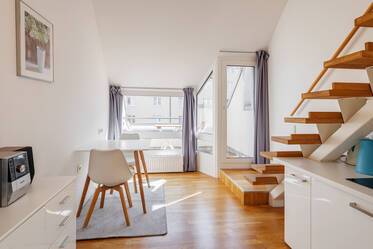 Эксклюзивно меблированная двухэтажная квартира в Maxvorstadt