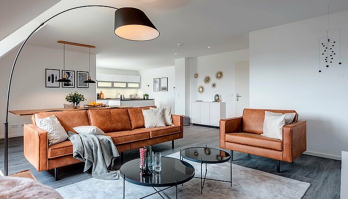 [Translate to russisch:] Eingerichtetes Wohnzimmer